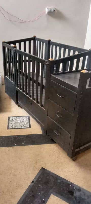 "Baby Cot in Excellent Condition for Sale" 2. "High-Quality 1