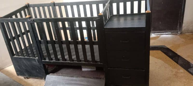 "Baby Cot in Excellent Condition for Sale" 2. "High-Quality 2