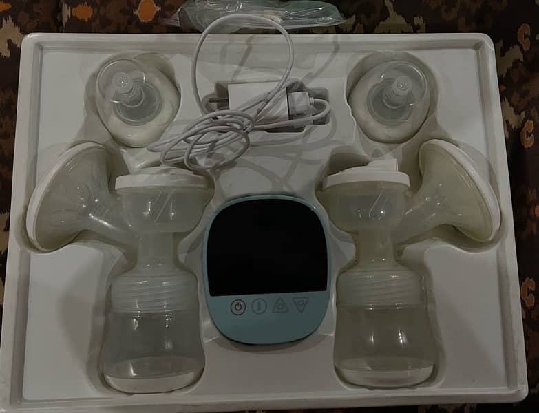 Automatic Double Breast Pump with 1 Manual Pump also 2