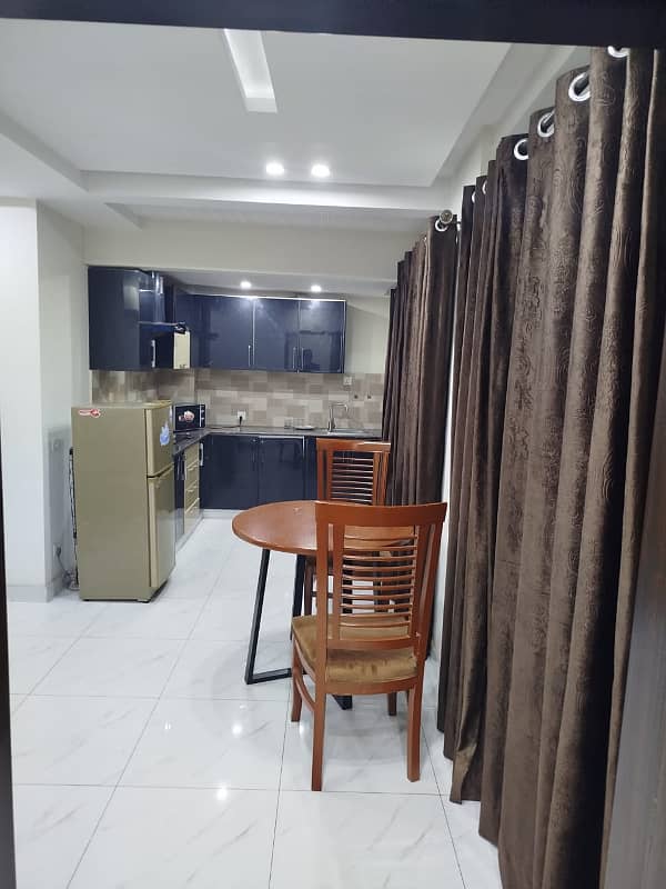 Par day short time one bed appatment for rent bahira town phase 6 any time available 3