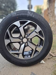 One Genuine Alpha Sportage Rim with Tyre