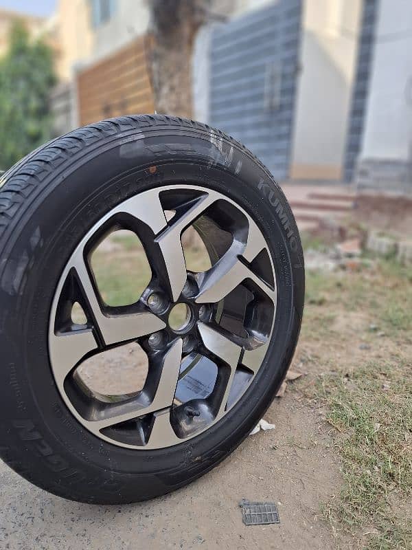 One Genuine Alpha Sportage Rim with Tyre 1