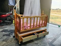 Neat and clean swing baby bed for sale