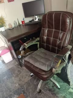 Wood table and leather chair