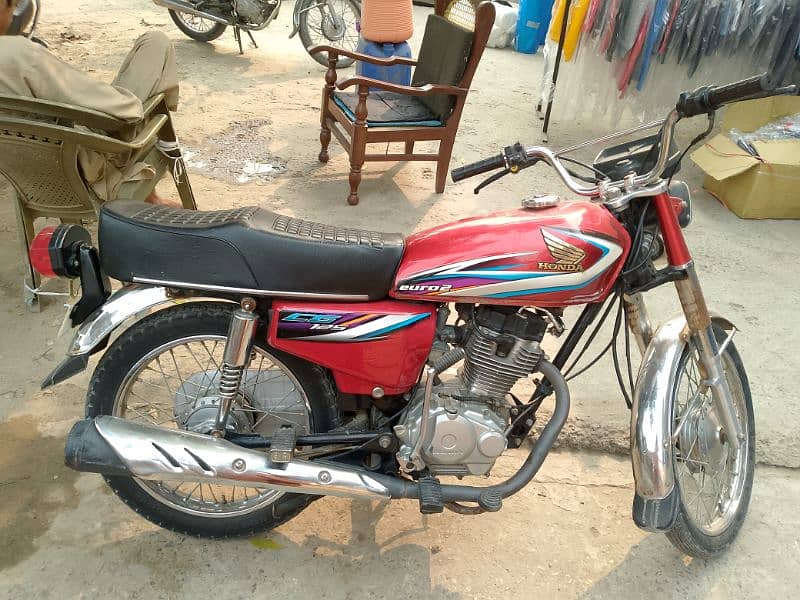 honda 125 1 hand use all. oky sound less 8