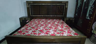 king size bed with dressing  and side tables