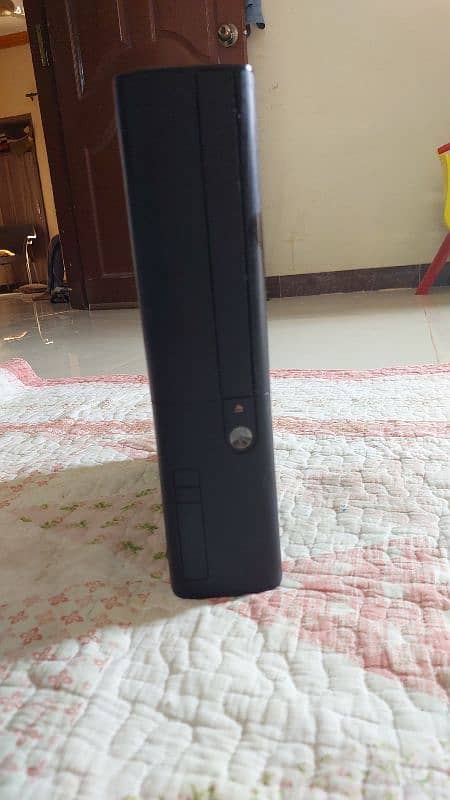 xbox 360 E with 2 wireless controller and 11 orignal game cds 2