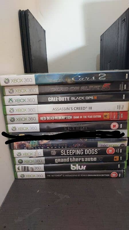 xbox 360 E with 2 wireless controller and 11 orignal game cds 5