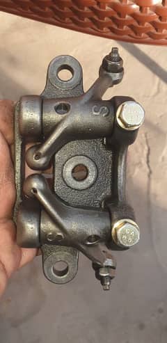 honda 125 rocker arm rocker plate