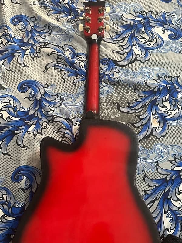 03092477789Dielisi branded red colour guitar all ok no any fault 1