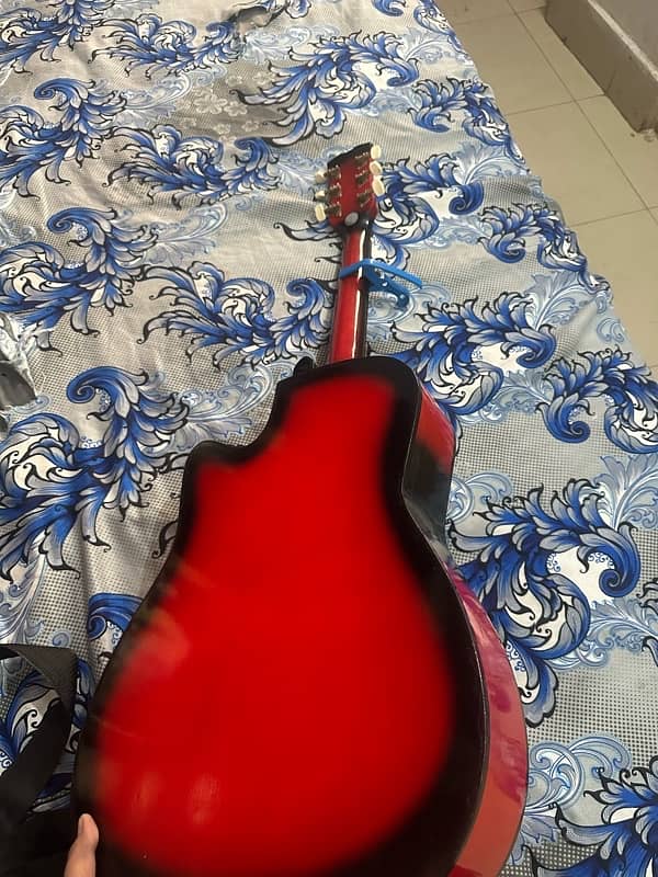 03092477789Dielisi branded red colour guitar all ok no any fault 10