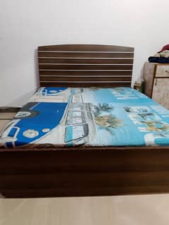 wooden single bed