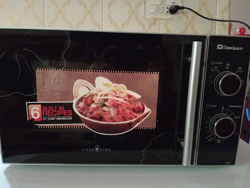 DW MD 7 Heating Microwave Oven 1