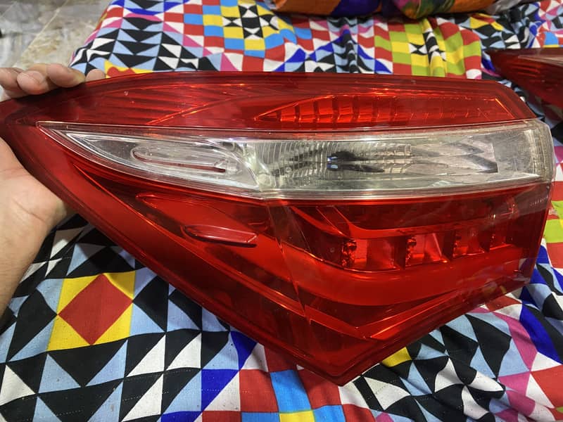 TOYOTA COROLLA GLI GENUINE BACK LIGHTS 0