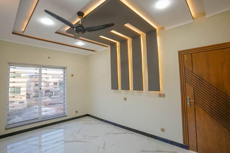 Bahria Town Phase 8, 9 Marla Corner Designer House 4 Beds With Attached Baths Outstanding Location On Investor Rate 18