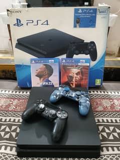 PS4 slim 500 GB with 2 Original controllers and 2 Games