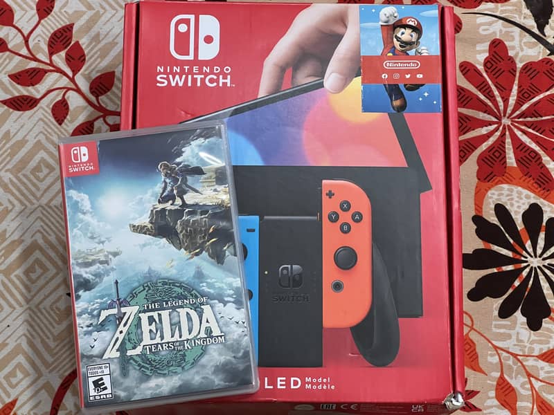 Nintendo Switch OLED Brand new + game 0