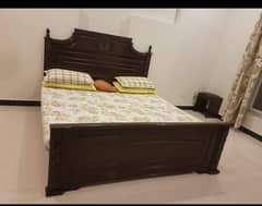 wooden king size Bed.