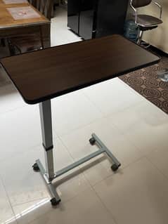 height adjusting table for patients