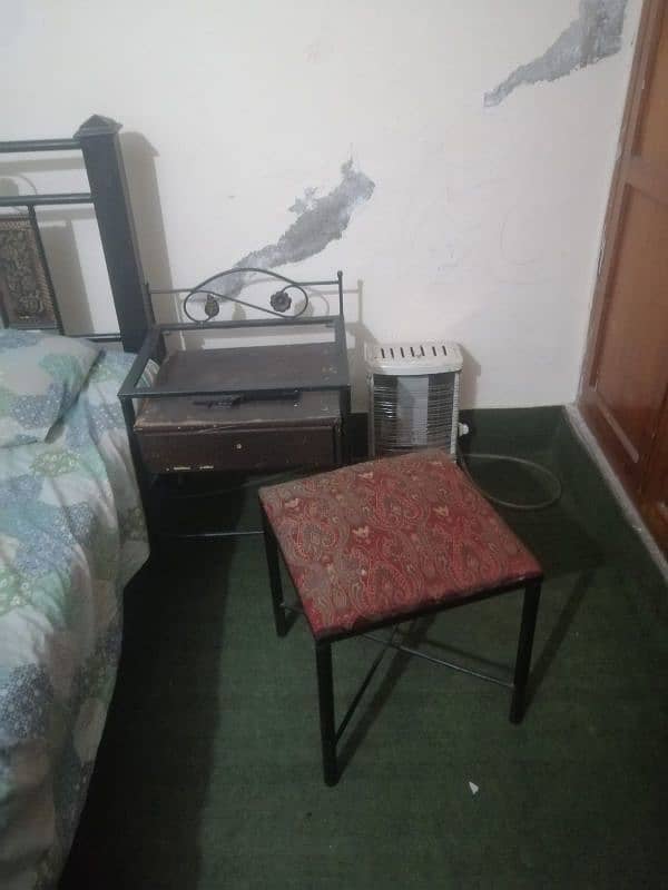 iron bed with side tables nd dressing table nd matress . . . 1