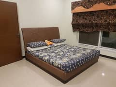 Imported bed with leather cushion.