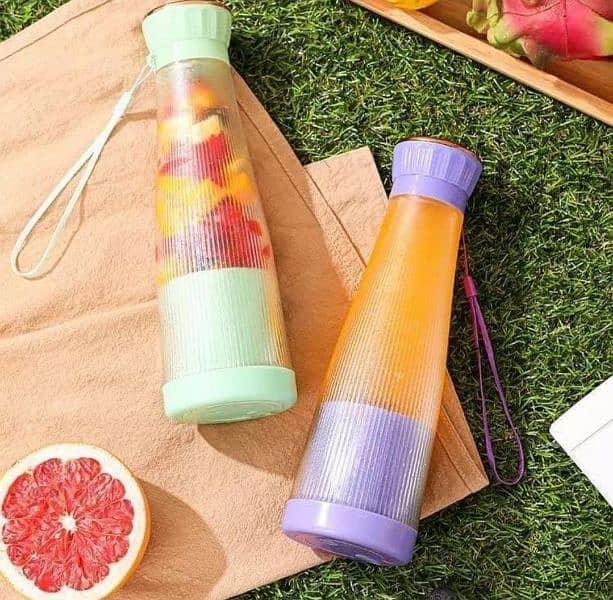 compact manual fruits juicer bottle 0