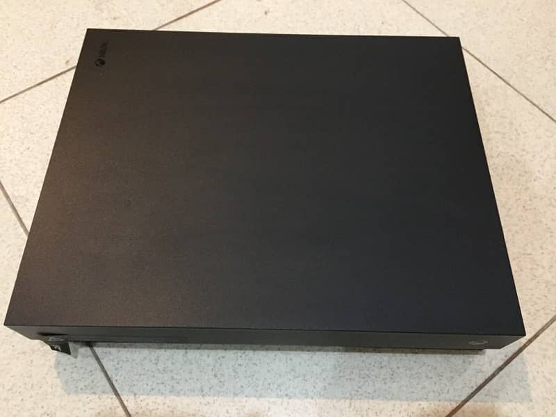 Xbox one X 1 TB with box and controller 2