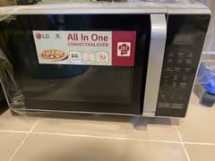 LG microwave oven in like new condition stainless steel