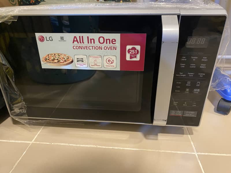 LG microwave oven in like new condition stainless steel 0