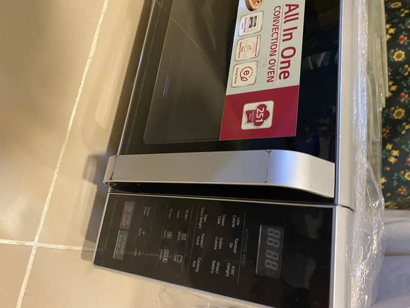 LG microwave oven in like new condition stainless steel 2