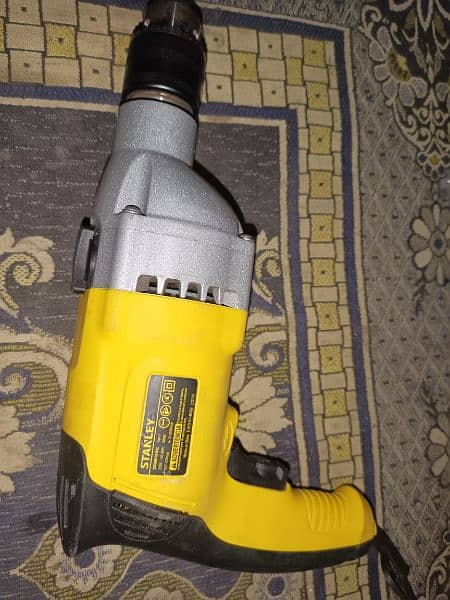 10000.          Stanley drill machine 1