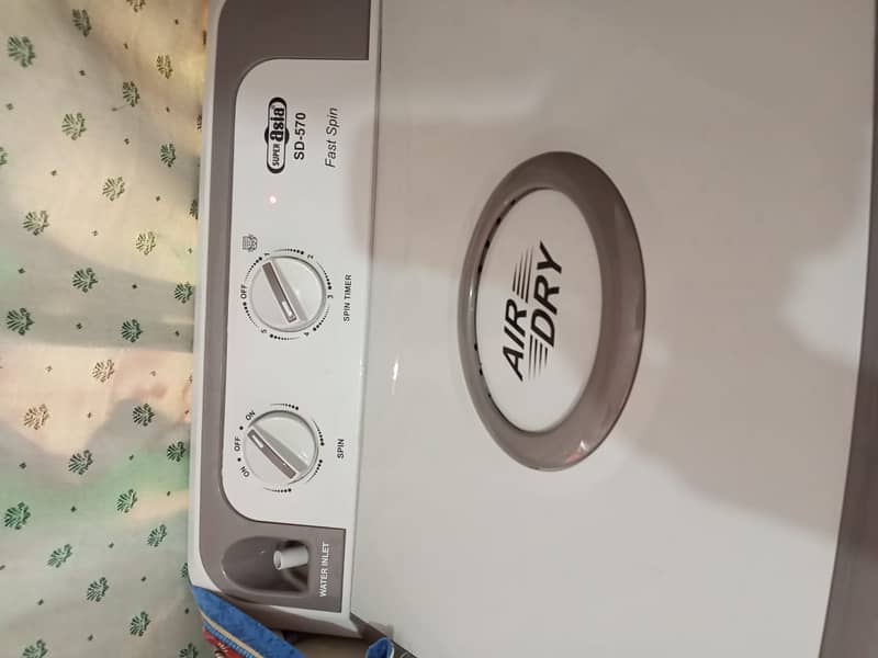 Super asia model washing machine and dryer just like new only 6 month 2