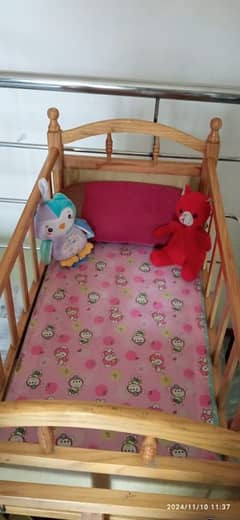 interwood pre loved baby cot/grib