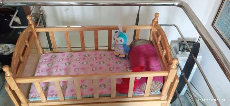 interwood pre loved baby cot/grib 2