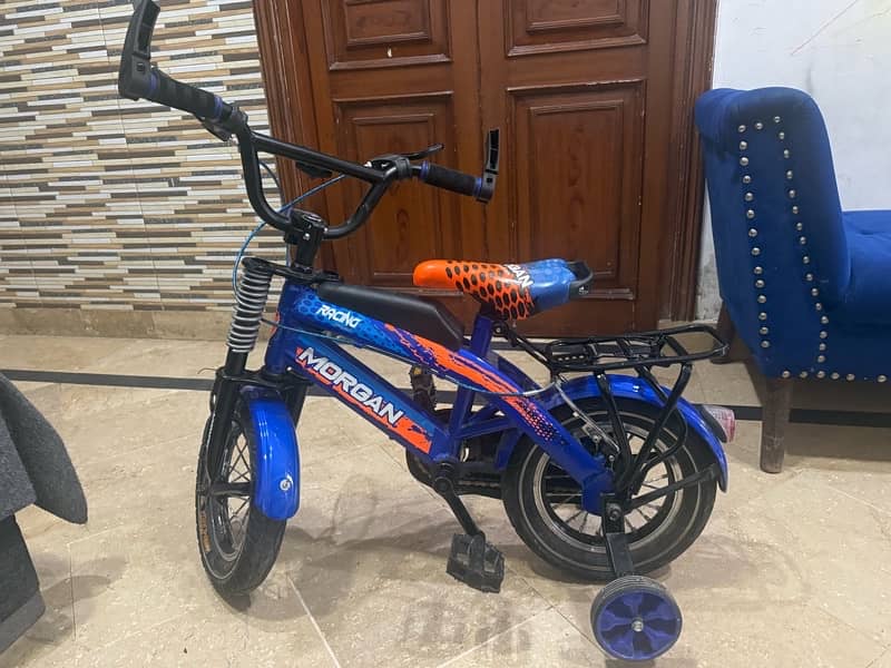 kids bicycle with supporting wheels 0