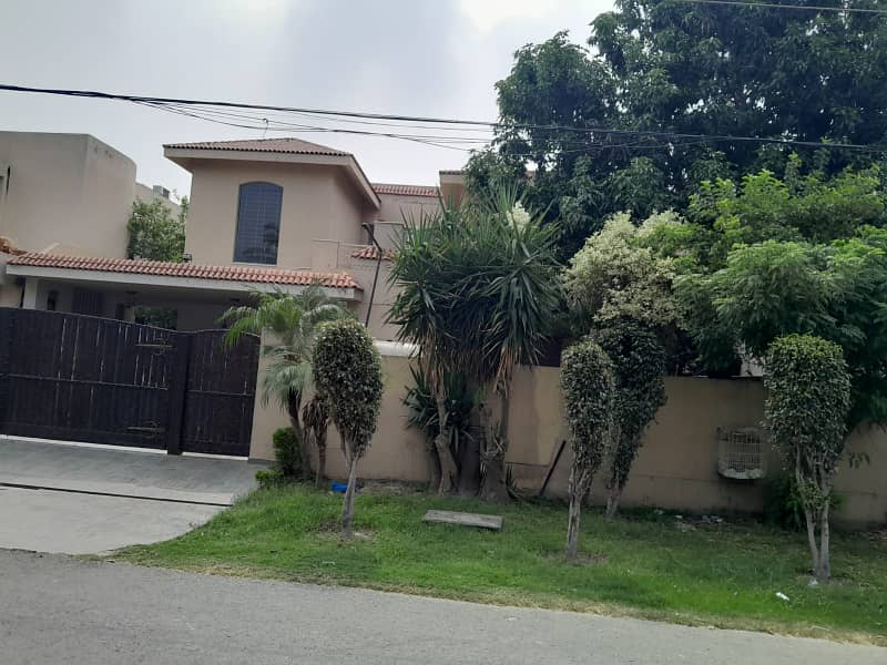 1 Kanal beautiful solid Owner Build house available in Phase 4 DHA Lahore in Very reasonable price 0