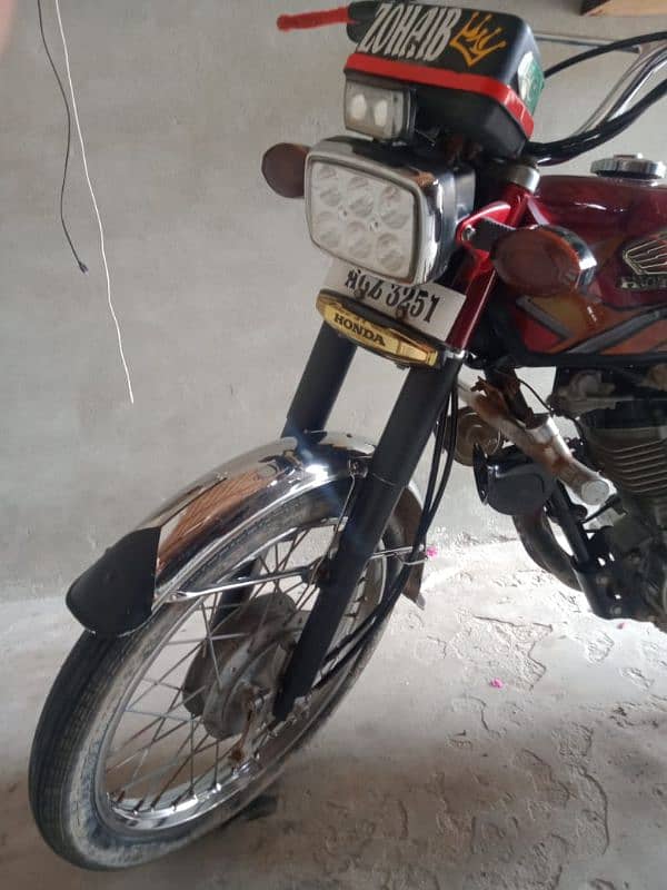 125 Honda 2021 model bilkul saaf condition WhatsApp num 0302/0033368 5