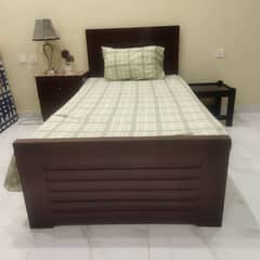 Single sized Wooden bed with side table