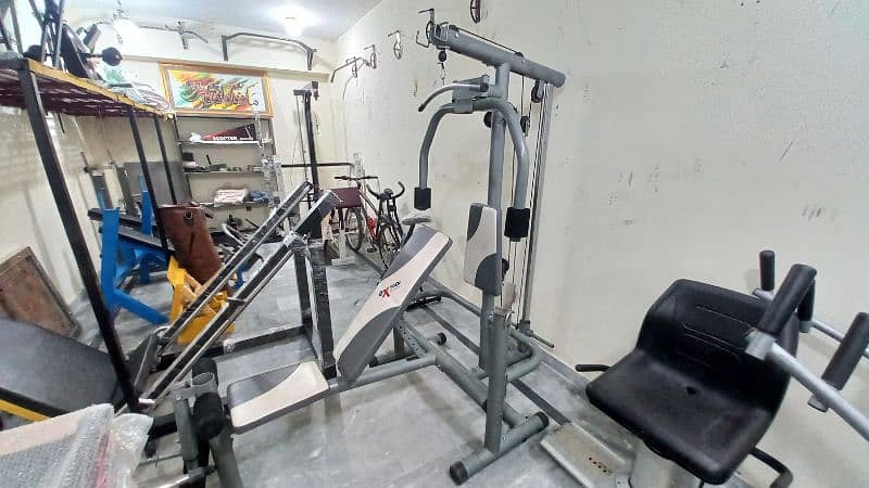 multi gym home station lat pull down bench press butterfly machine gym 0