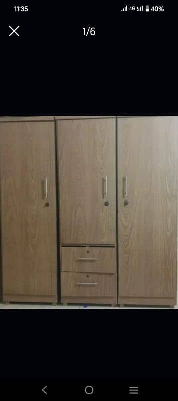 Laminated glossy 3 door Wooden cupboard with drawers for sale 1