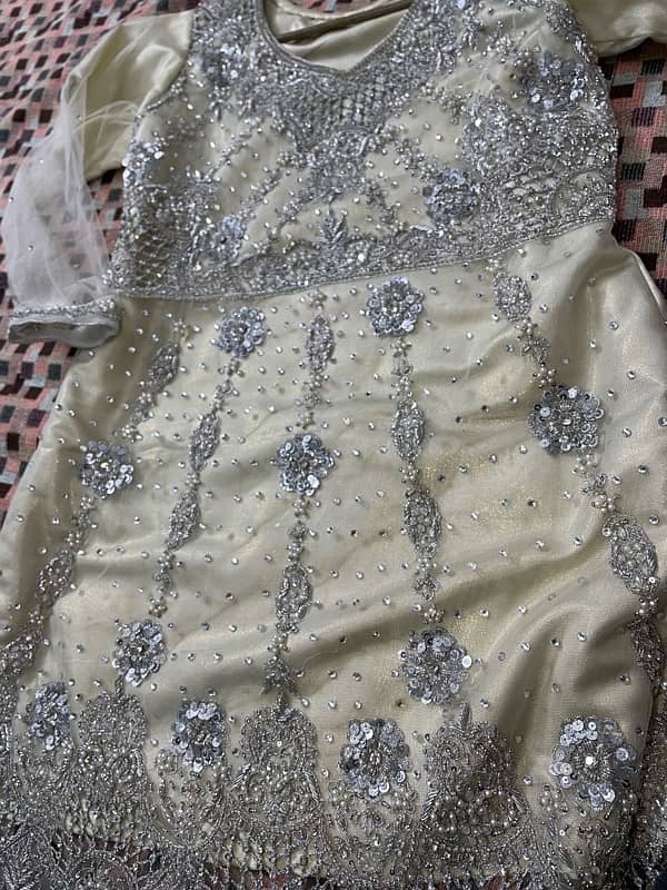 Off white Ghararah , Shirt with silver work with net Dubattah 6