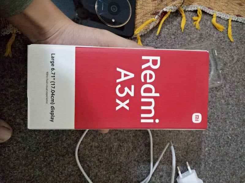 Redmi A3 x with box and charger 3