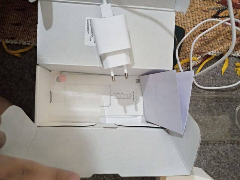 Redmi A3 x with box and charger 10