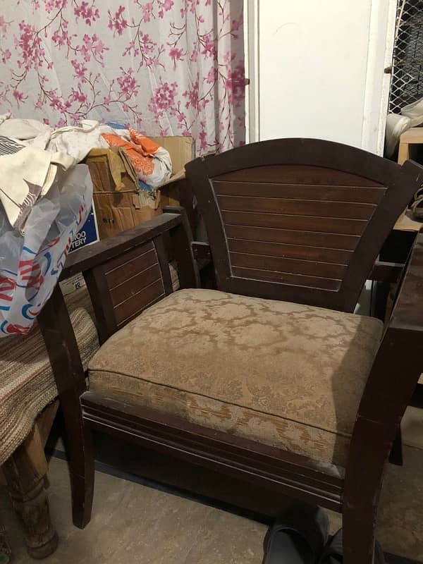 wooden sofa set with rounded center table 0