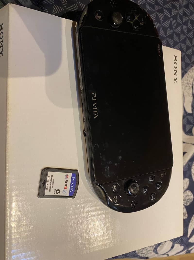 PS Vita Slim jailbroken with 32gb card and games 5