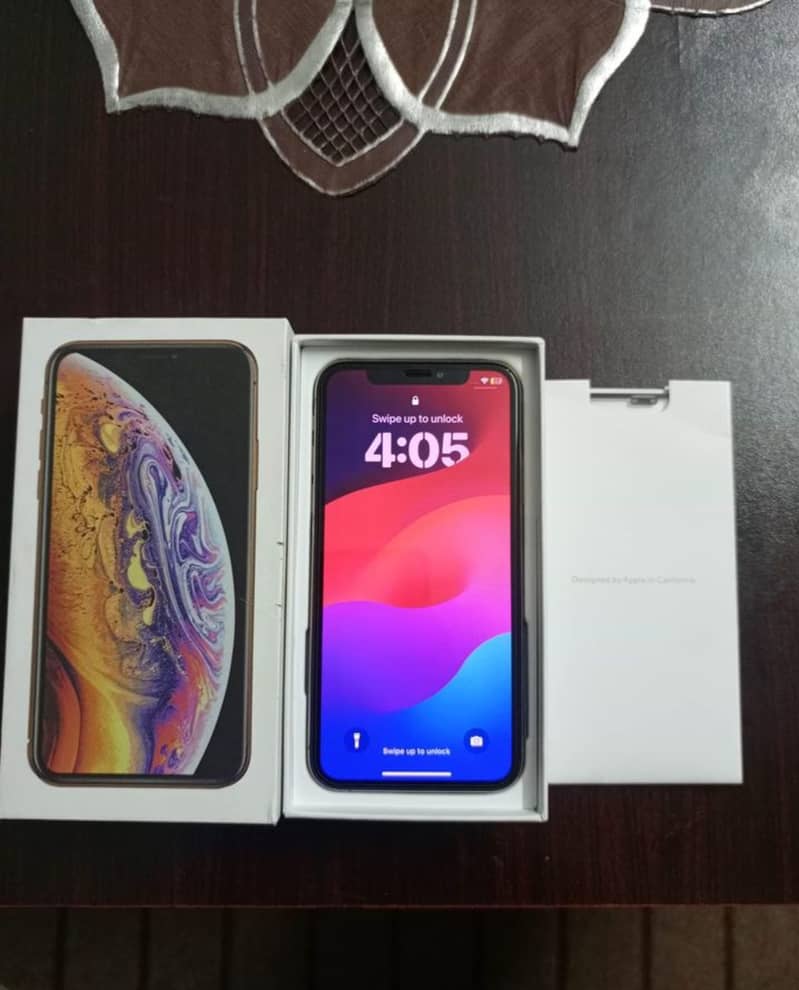 Iphone xs Golden Non. approved 64bg factory unlocked LL/A 2