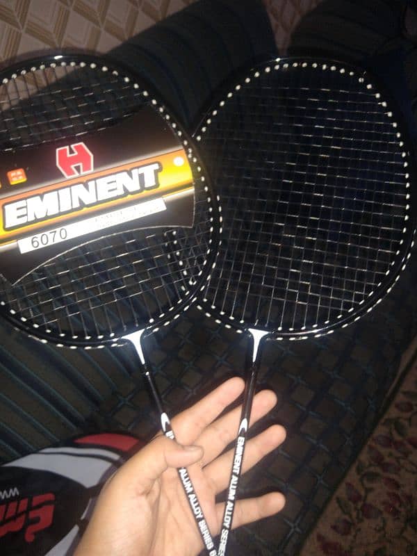 eminent pro 6070 racket set with bag and shuttlecock are available 6