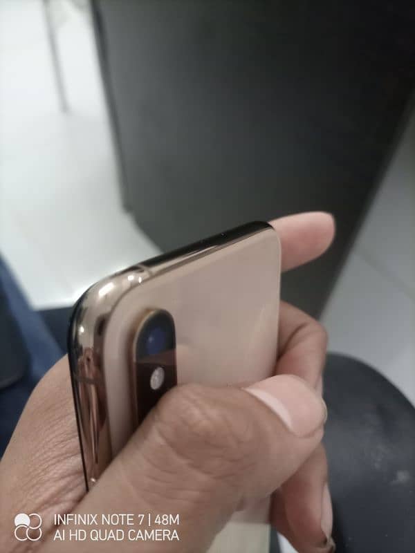 Iphone xs  gold e sim working 5