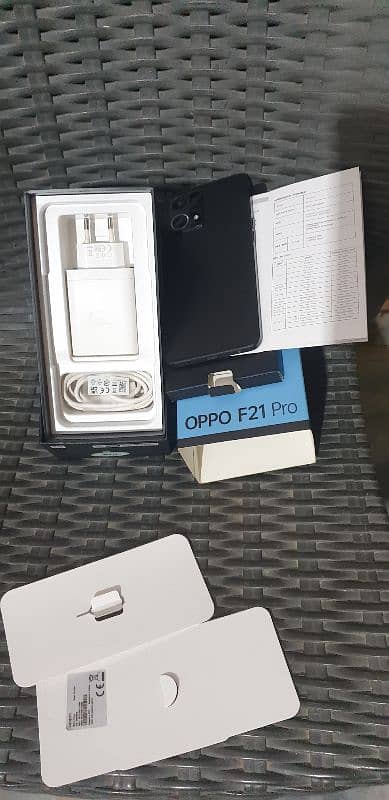 Oppo f21 pro with data cable,charger,and box for urgent sale. 0