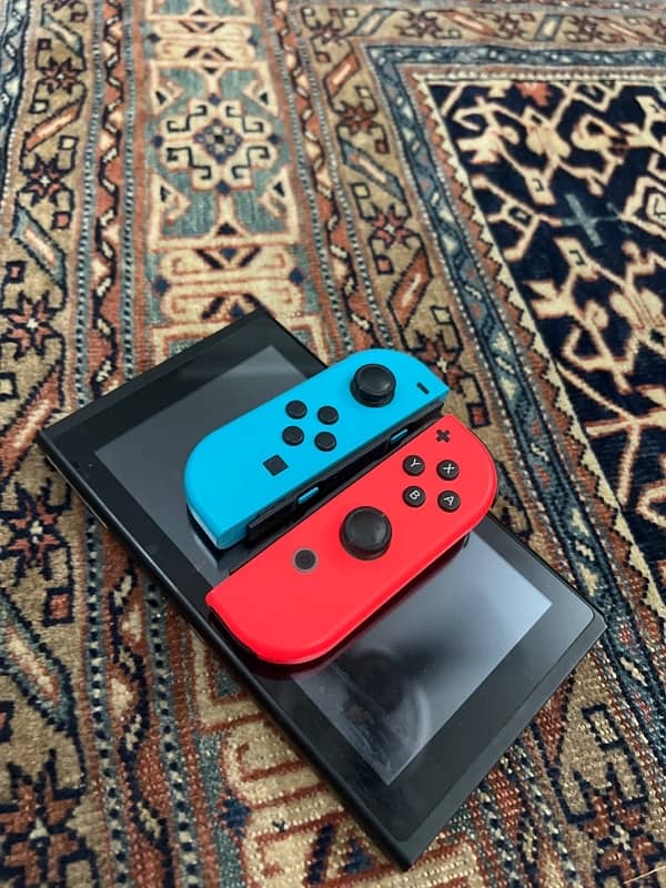 Nintendo Switch orignal edition + 2 games 1